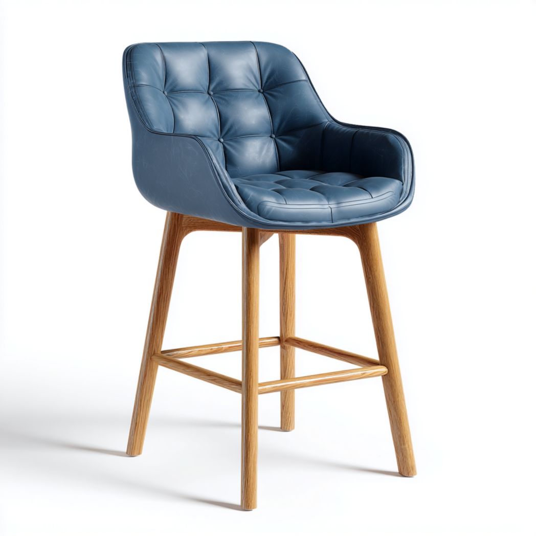 Sgabello alto con seduta trapuntata blu in ecopelle e gambe in legno di frassino